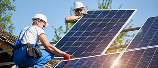 Professionals installing solar panels